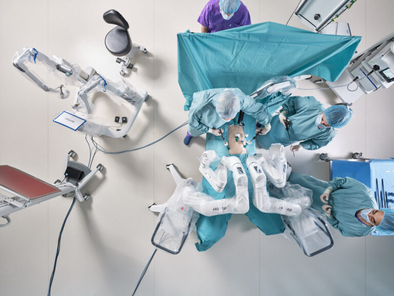 Image of surgeons using Dexter robotic system